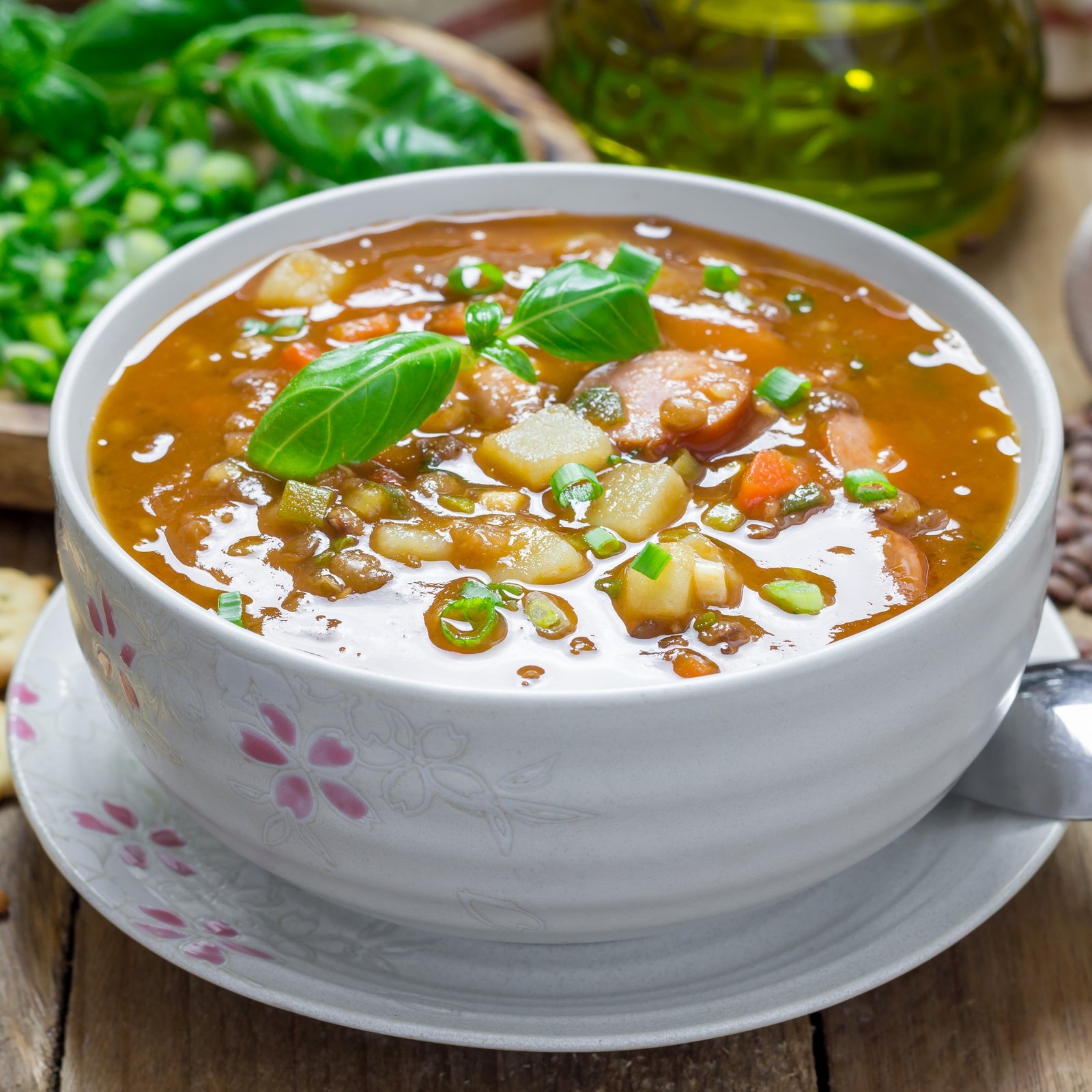 Homemade soup with lentils and sausages, square